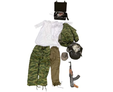 FILM PROPS; a collection of props including a replica Kalashnikov (AK47), length 63cm, a duffle bag with one hundred dollar b
