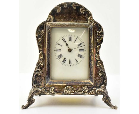 WILLIAM COMYNS &amp; SONS; an Edward VII hallmarked silver desktop clock, the circular dial set with Roman numerals and outer