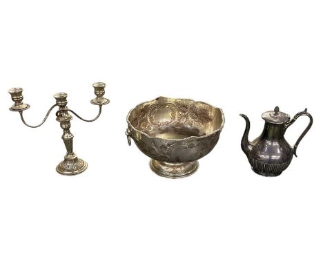 A silver plated punch bowl, with lion head handles and with floral decoration around the circumference, diameter 33.5cm, heig