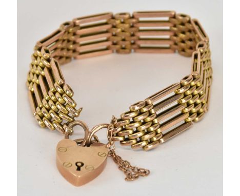A 9ct yellow gold gate link bracelet with padlock clasp, length approx 17cm, approx 20g.