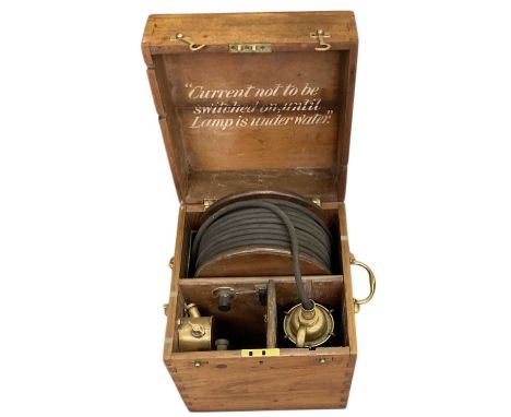 An early 20th century diver's lamp, in fitted oak case, the lamp constructed of six veins around pear shaped glass shade with