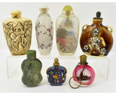 A group of six Oriental snuff bottles, two with painted interior detail, largest height 8.5cm, a plastic bottle with carved f