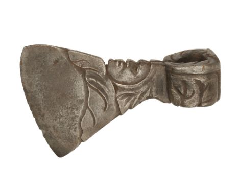 An unusual figural axe head apparently found in France profiled as a caricature of a master cooper with a portrait of his son
