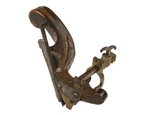 A rare coachbuilders tailed compass plough plane in hornbeam with unusually decorative brass inlays and elaborate brass fence