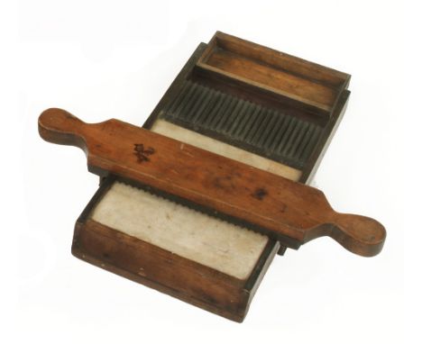 A heavy mahogany and brass pill roller with marble slab and drawer G+