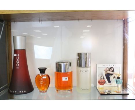 Five Vintage Shop Display Perfume Bottles / Stands to include ' Rochas Femme ', ' Calvin Klein ', ' Hugo Boss ' and ' Nina Ri