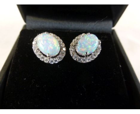 Pair of opal cluster silver and CZ stud earrings 