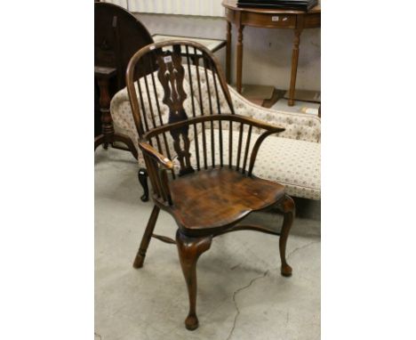 18th century Style Elm Seated Windsor Hoop and Stick Back Elbow Chair raised on cabriole legs with crinoline stretcher