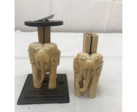 A pair of 1920's ivory elephant lamp bases