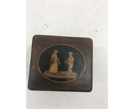 An early 19th century inlaid tea caddy