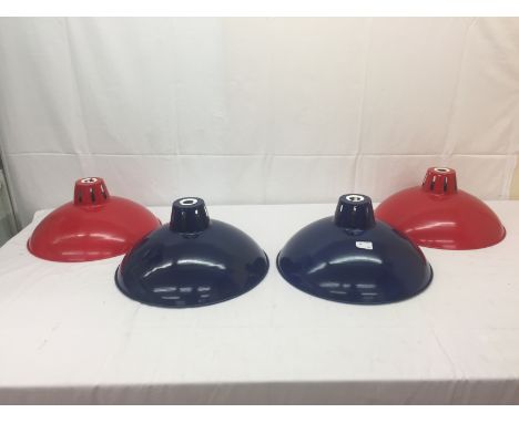 Four industrial metal and enamel pendant lamp shades: red and blue