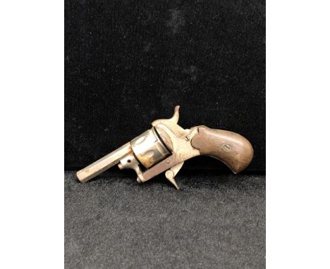 A 1920s starting pistol CONDITION REPORT: Trigger half snapped. Missing loading gate trigger cover. Not locking, trigger sear