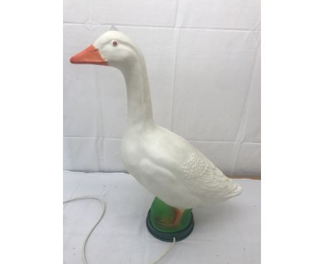 A large lamp in the form of a goose