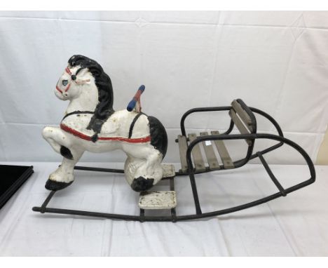 A Tri-Ang crane and cement mixer; together with a metal rocking horse