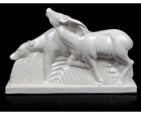 After Charles Lemanceau/Gazelles/French Art Deco crackle glaze ceramic group of a pair of gazelles, moulded 'WA' mark to one 