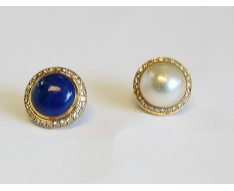 A diamond and lapis lazuli single earring, the circular lapis cabochon to a surround of round brilliant cut diamonds to a yel