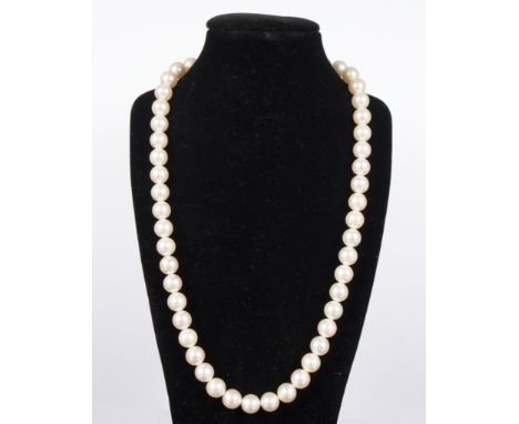 A single strand cultured pearl necklace, the 9ct gold clasp set with diamonds, approximately 43cm long