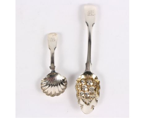 A George IV silver caddy spoon, James Bell, Newcastle 1823, with shell bowl and a George III berry spoon, approximately 57gm 