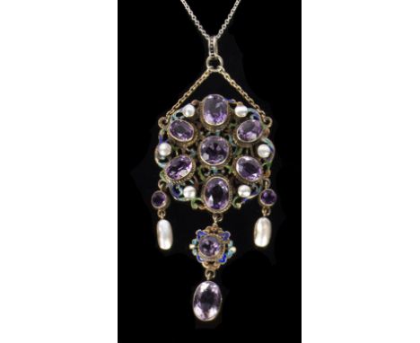 An Austro-Hungarian amethyst and mother-of-pearl pendant with enamelled open work frame, suspending drops, cased/see illustra