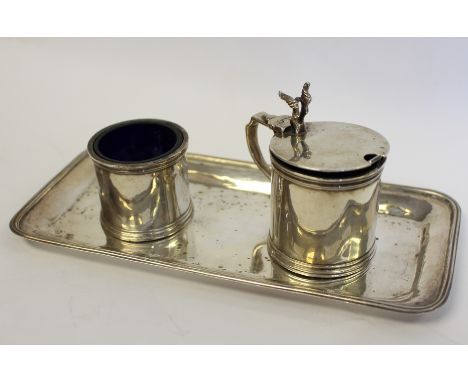 A rectangular silver cruet set stand, by Guild of Handicraft, 2006, a matching mustard pot and spoon and a plain drum-shaped 