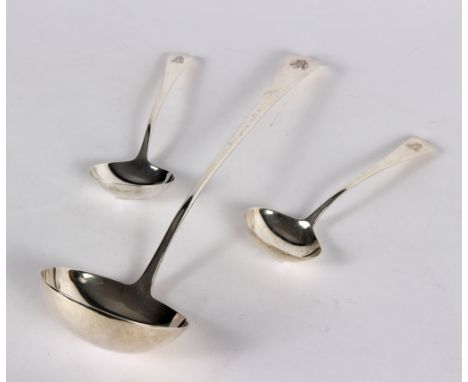 A George III silver soup ladle, R C, London 1806, and a pair of sauce ladles, William Eley & William Fearn, London 1821, all 