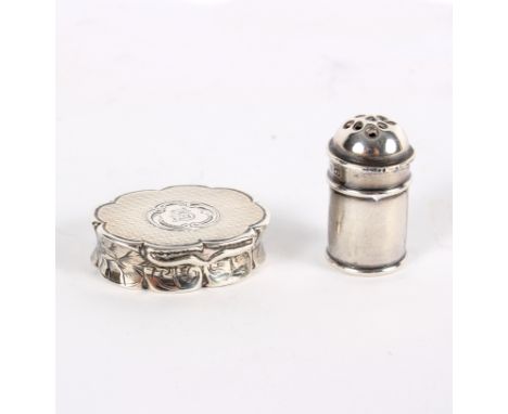 A Victorian silver oval shaped vinaigrette, Edward Smith, Birmingham 1859, with engine-turned decoration, pierced grille and 