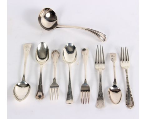 A sterling silver Christening spoon and fork, another Christening spoon and fork initialed C, two other forks, a silver ladle