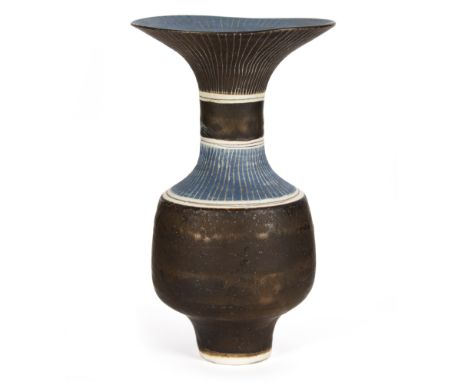 Dame Lucie Rie (Austrian/British 1902-1995)/Porcelain bottle vase/with flared rim, decorated bands of manganese and blue glaz