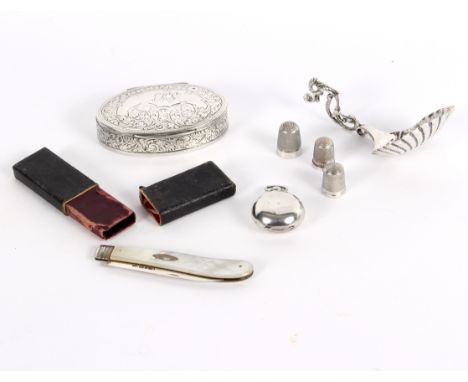 An oval silver snuff box, FWT Ltd, Birmingham 1897, initialled, 8cm wide, a silver bladed penknife with mother-of-pearl handl