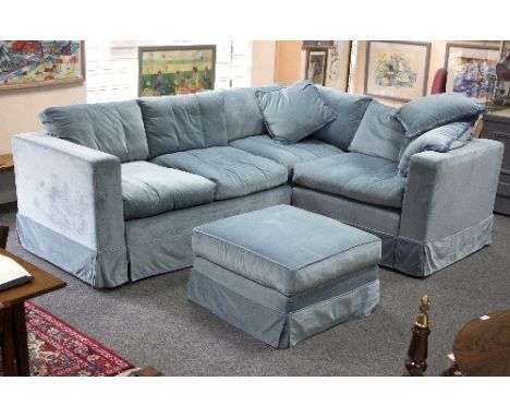 A Sofa.com Stella corner sofa and matching footstool, feather filled, with duck egg blue covers, of three separate sections o