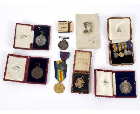 Leslie R A Regan, a small archive, War Medal 1914 1918, the Victory medal, Coronation medal 22nd June 1911, the miniatures fo