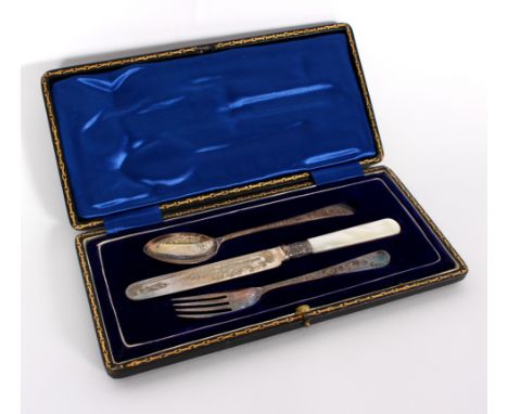 A Christening knife, spoon and fork, JL & S, Sheffield circa 1910, the knife with mother-of-pearl handle, in fitted case and 