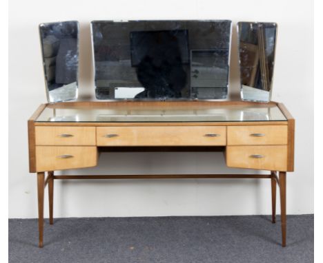 Alfred Cox for Heals/Bedroom suite in maple and walnut/comprising dressing table, 141.5cm wide, a six drawer chest, 122cm wid