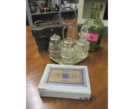 A mixed lot comprising early 20th century opera glasses, cased, a silver plated cruet set, playing cards and a Woodcock &amp;