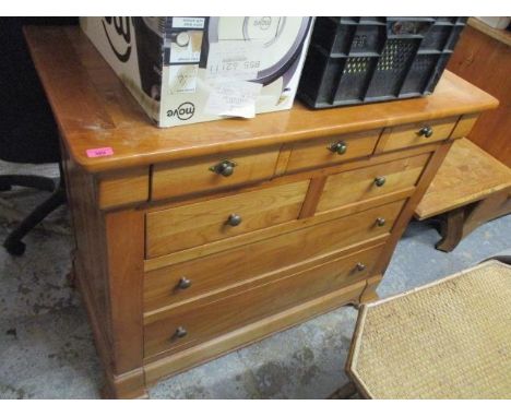 A modern French style cherrywood chest of seven drawers standing on bracket feet 37"h x 45"w 