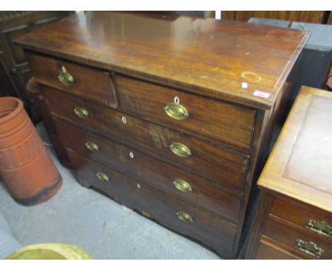 A Georgian mahogany chest of two short and three long drawers having inlaid banding and standing on bracket feet, 39" h x 43"