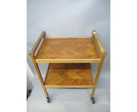 Jack Christmas furniture comprising a walnut two tier tea trolley with turned handles, 28"h, 22"w and a sycamore and oak chai