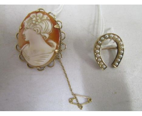 A late Victorian/Edwardian 15ct gold and split seed pearl, horseshoe brooch and a 9ct yellow gold and shell cameo brooch, sta