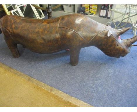 A large leather Harrods rhinoceros manufactured as a foot stool, possibly purchased in the 1970s, 74"l 