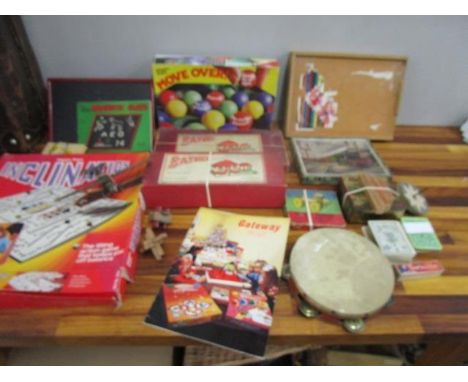 A mixed lot of toys and games to include Baulp sets No 1c and No 2c, a Britains metal model Spitfire with pilot, Wiggins Teap