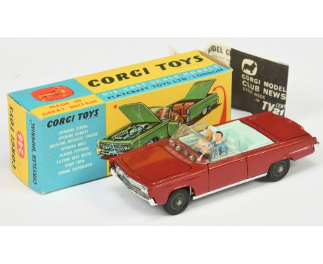 Corgi Toys 246 Chrysler Imperial - red body, pale blue interior with figures, chrome trim, cast hubs and with golf bag &amp; 