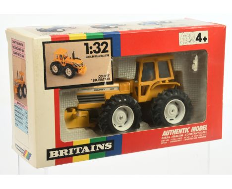 Britains 9521 County 1884 Tractor - yellow, black with figure driver this harder issue to find is Near Mint in Good Plus rain