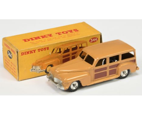 Dinky Toys&nbsp; 344 Plymouth Estate Car - Tan body, brown side and rear panels, silver trim and light beige and harder to fi