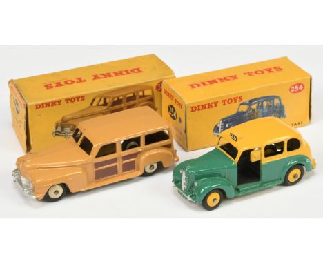 Dinky Toys&nbsp; A pair - (1) 254 Austin "Taxi" Two-Tone Green and yellow including rigid hubs, black base, interior and figu