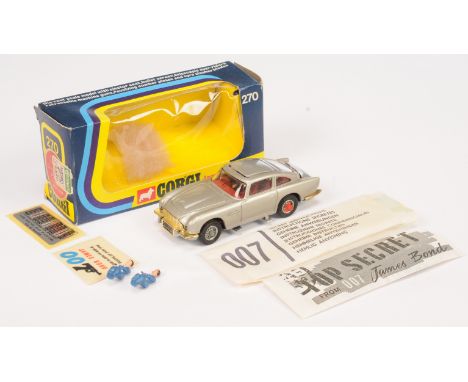 Corgi Toys 270 "James Bond" Aston Martin DB5 - Silver, red interior with "James Bond" figure, Tyre slashers, gold bumpers - E
