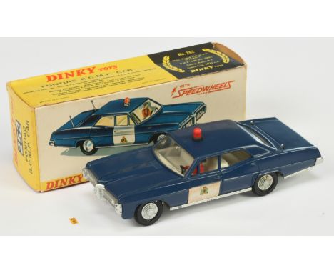 Dinky Toys 252 Pontiac Parisienne "RCMP" - Blue with white door labels, ivory interior with figure, cast hubs, solid red roof