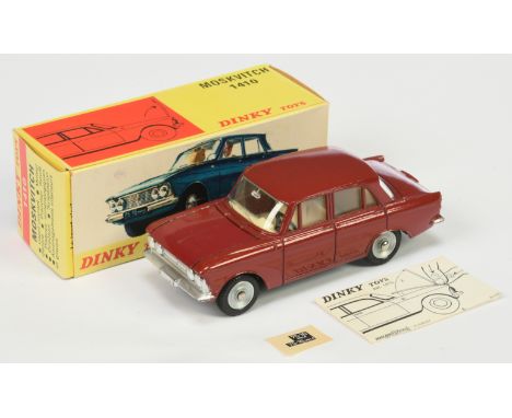 French Dinky Toys 1410 Moskvitch - dark red body, pale cream interior, silver trim, concave hubs - Good Plus still a bright e