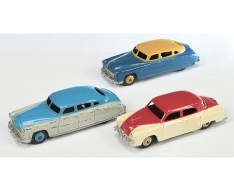 Dinky Toys Unboxed Group Of 3 (1) 172 Studebaker Two-Tone High-Line - cerise, cream with light beige rigid hubs, (2) 171 Huds