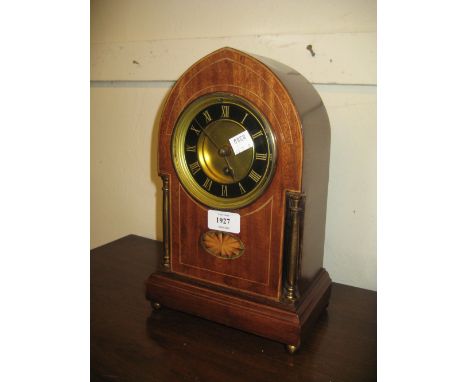 Early 20th Century mahogany line inlaid and gilt metal mounted lancet shaped mantel clock with circular brass dial having bla