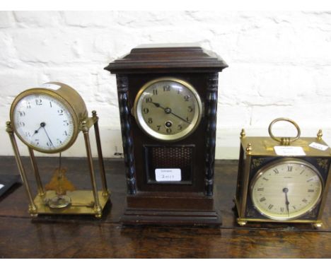 Lacquered brass cased portico style mantel clock, having circular enamel dial with Arabic numerals and key wind movement with